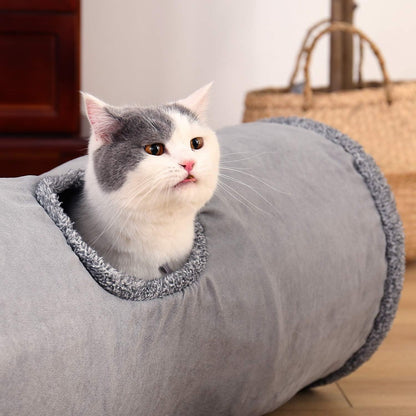 "🎉 Unleash the Fun! 🐾 Check out our Collapsible Cat Tunnel - the ultimate playtime hideaway for your furry friend! 🐱✨ Durable suede, crinkle sounds, and a fun ball included! 🐾💖 #CatLovers #PetPlaytime"